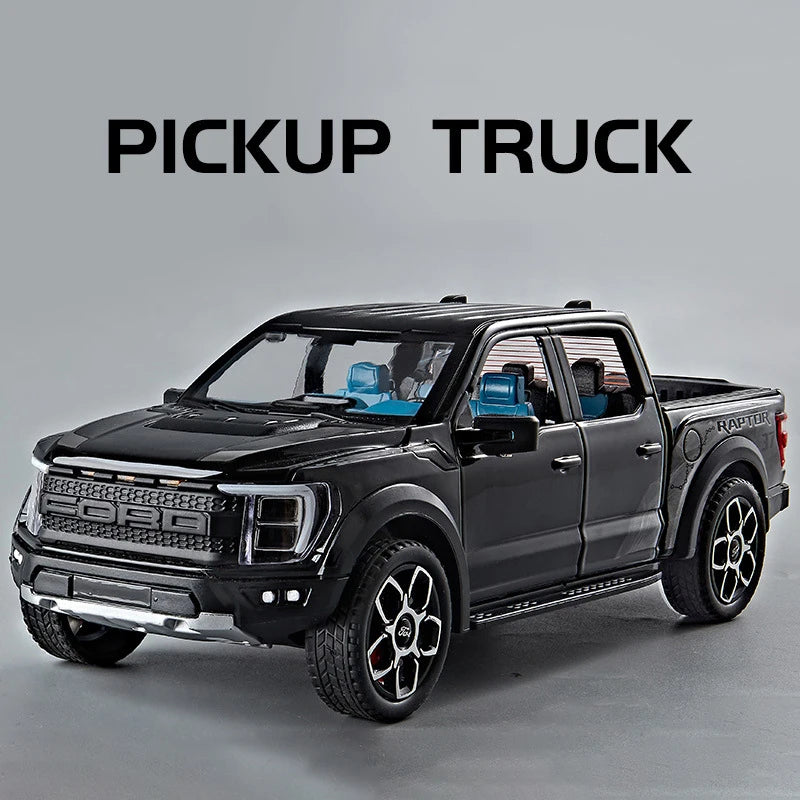 A black 1:20 scale Ford Raptor F150 diecast model truck is shown in a side profile against a gray background.