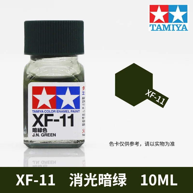 Tamiya color enamel paint kit labeled XF-11, a green model paint, in a glass bottle.
