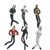 A collection of five poseable plush dolls depicting Michael Jackson in various outfits and poses.