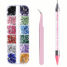 A set of multi-size flat back acrylic rhinestones in various colors displayed alongside a nail art tool.