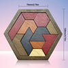 A wooden hexagon puzzle made of seven interlocking pieces in various shades of brown and red.