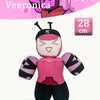 A pink and black plush rabbit stuffed toy with large ears and a facial expression, displayed against a pink background.