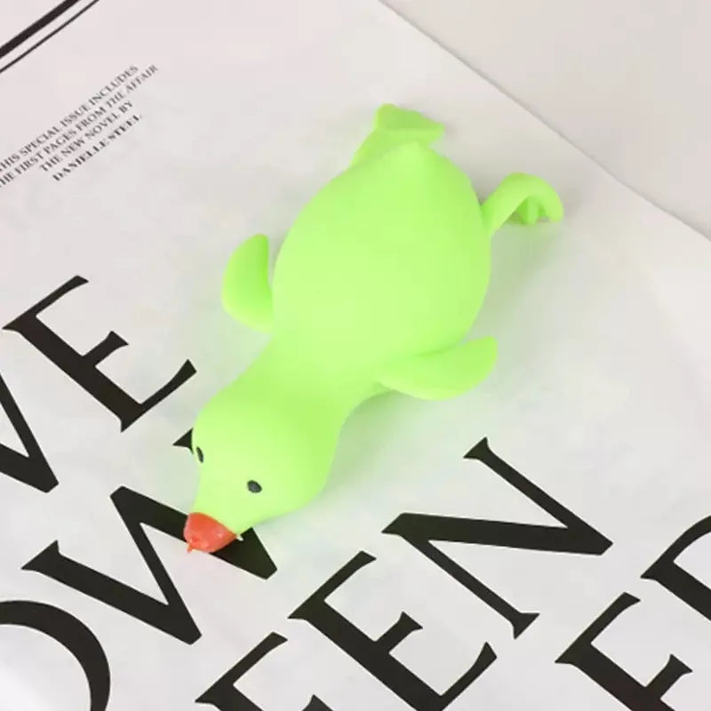 A bright lime green duck squeeze toy is shown on a white background with black text.
