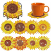 A set of DIY floral diamond painting coasters featuring orange and yellow sunflower designs with a metal holder.