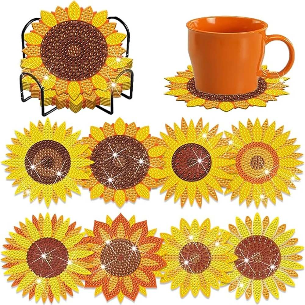 A set of DIY floral diamond painting coasters featuring orange and yellow sunflower designs with a metal holder.