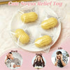 Yellow food-shaped squishy toys packaged in clear plastic on a white plate for stress relief