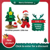 A set of Christmas building blocks featuring a little tree and a Santa figure.