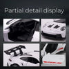 Partial detail display of a white Porsche 911 GT3 RS diecast model car showing interior and exterior features.