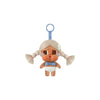 A vinyl figure of a character with blonde hair and blue accents, featuring a hook for display.