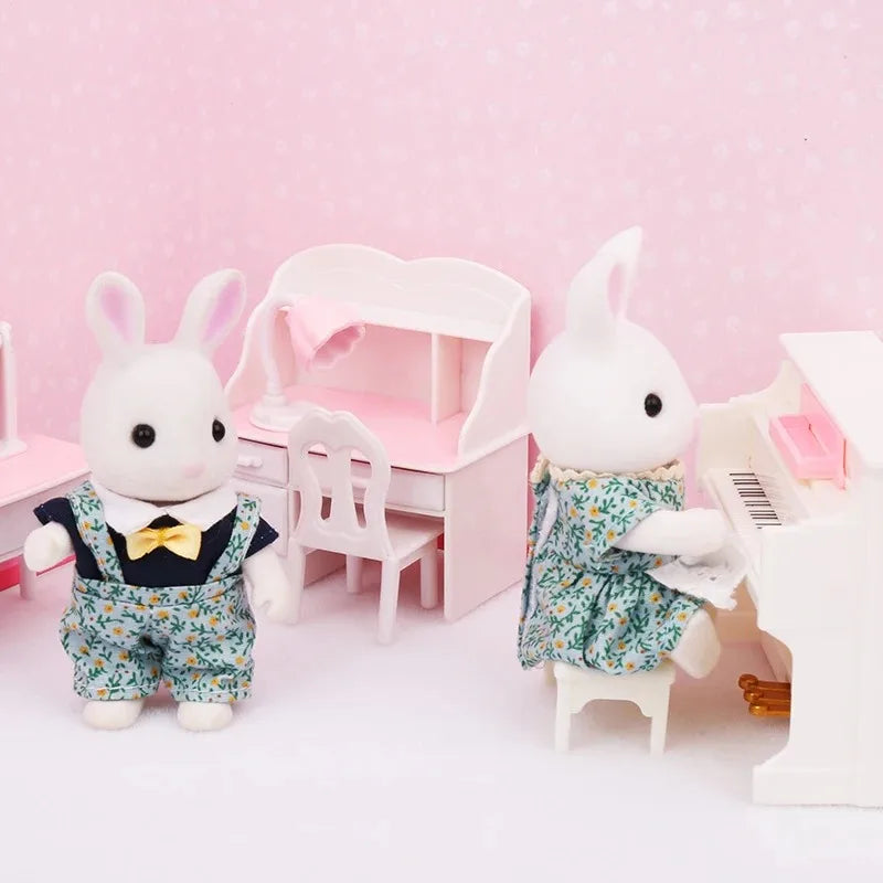 A white rabbit doll dressed in a green floral outfit sits next to a pink miniature furniture set.