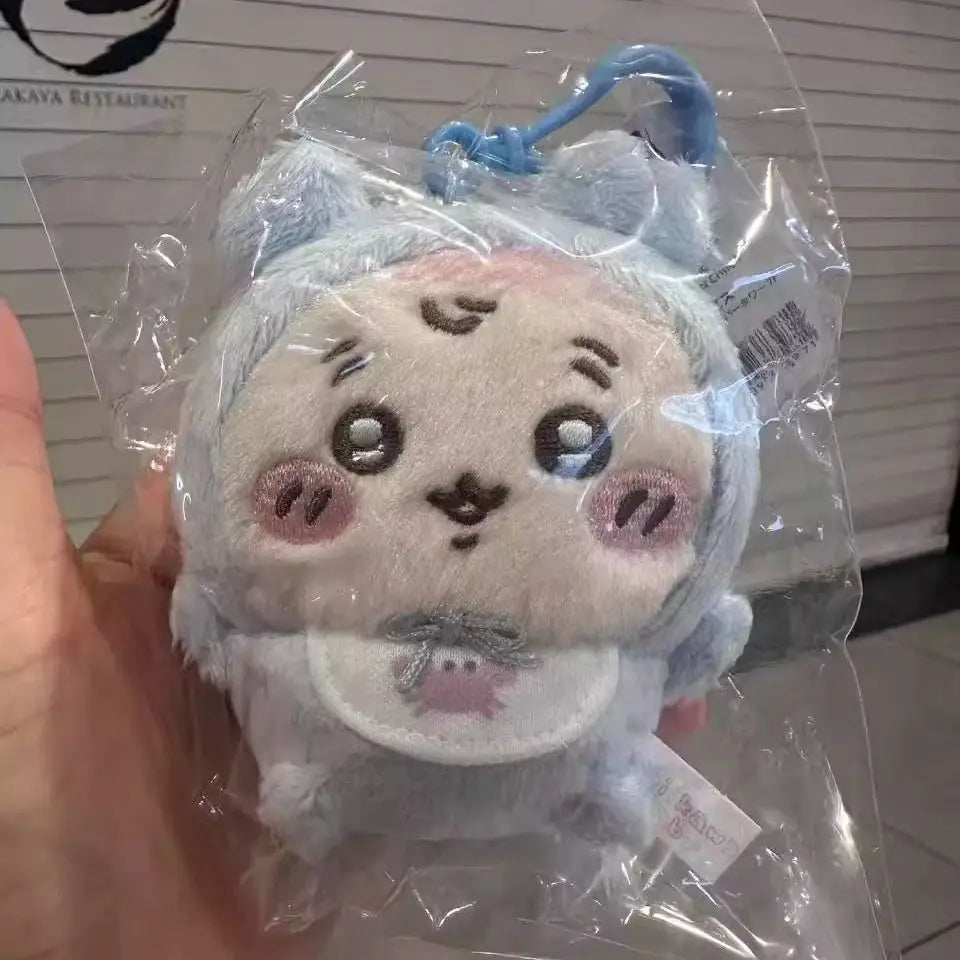 A plush keychain set featuring three cute animal characters, including Usagi, Hachiware, and JiYi, packaged in clear plastic.
