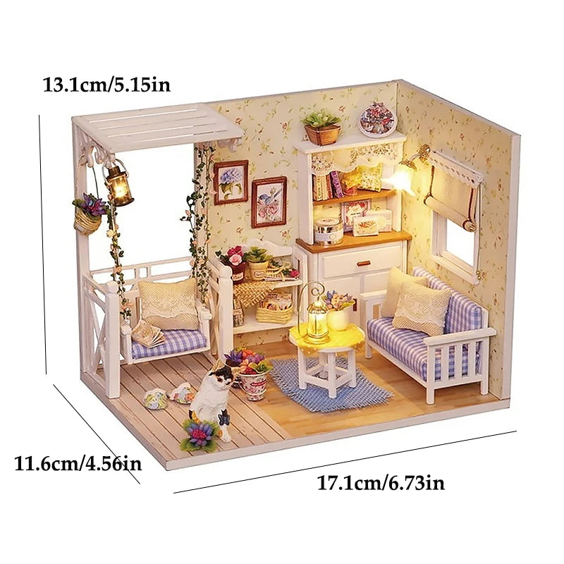A miniature dollhouse kit featuring furniture and decorative elements, including a cat figure.