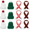 A set of mini knitted hat and scarf accessories for dolls featuring white and green yarn with red accents.