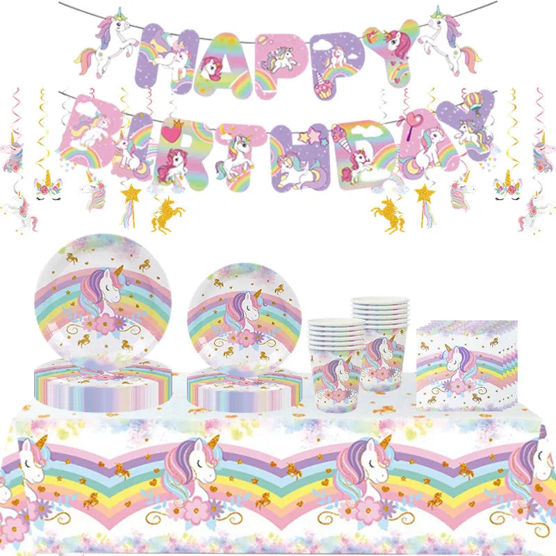 A colorful unicorn party supplies kit featuring a tiered cake decorated with rainbows and unicorns.