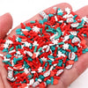 A pile of red and white polymer clay slices assorted for DIY crafts is held in a hand.