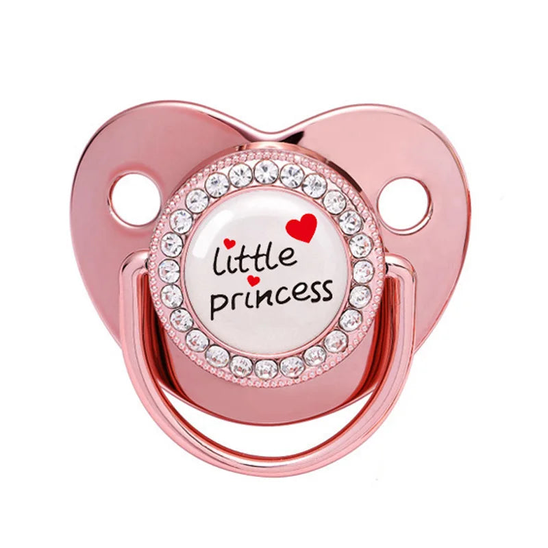 A rose gold crystal bling pacifier designed for newborns.