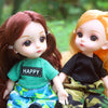 A close-up of two 16cm articulated BJD princess dolls with different hair colors and outfits sitting together.