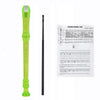 A green 8-hole soprano recorder with a cleaning rod and a fingering chart.