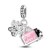 A silver heart charm bead with a paw print and a pink zircon detail attached to a chain.