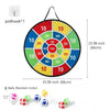 A circular dartboard with colored segments and a hanging mechanism, shown next to several small balls.