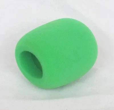 A smooth, oval-shaped green foam windscreen or pop filter cover.
