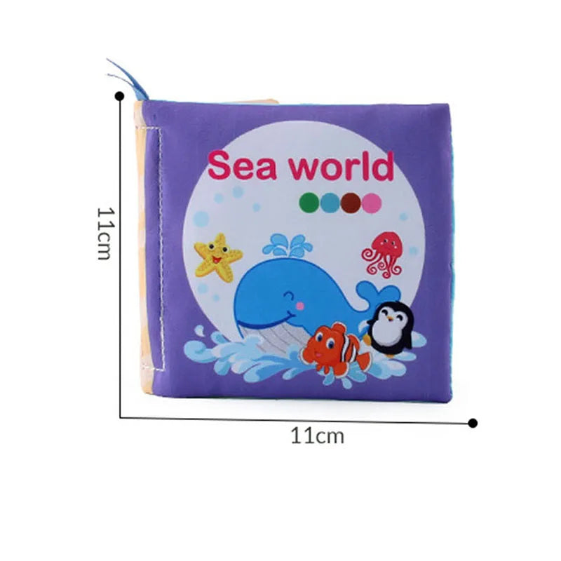 A purple fabric baby book titled Sea world featuring colorful sea creatures on a light blue background.
