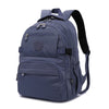 Sac à dos de voyage bleu marine et durable avec plusieurs compartiments zippés et bretelles noires.