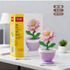 A set of 99 pink and green building block flowers in purple pots for home decor