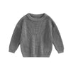A gray knit pullover sweater for kids with long sleeves.