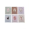Four sheets of vintage floral stickers in various shades of pink and green for scrapbooking