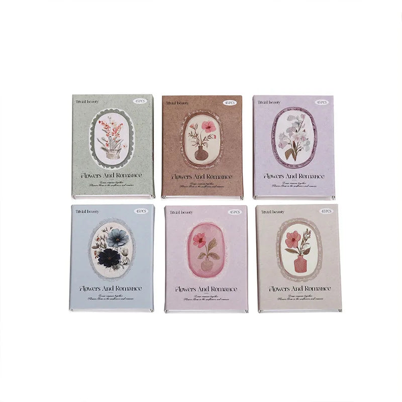 Four sheets of vintage floral stickers in various shades of pink and green for scrapbooking