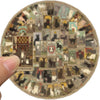 A circular image featuring a collage of cat tarot cards and illustrations.