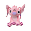 A pink plush figurine of a donkey character with large eyes and purple accents.