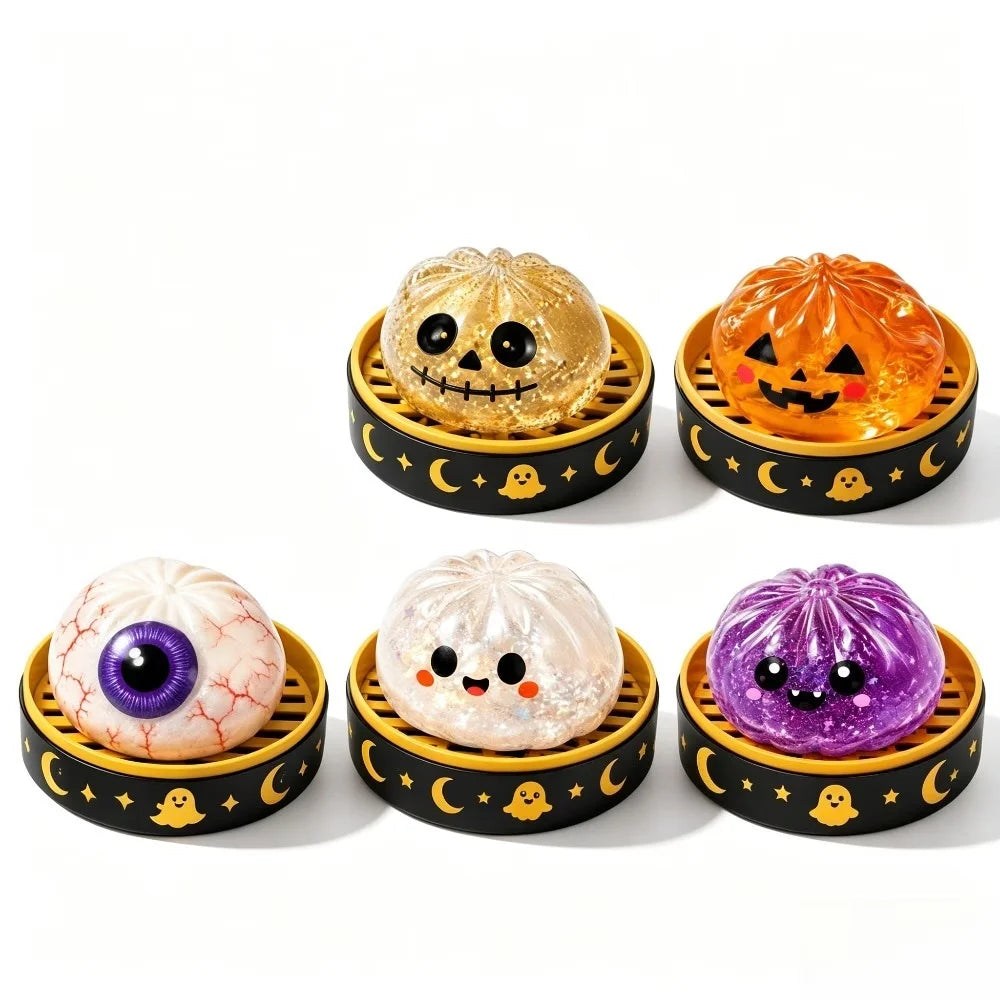 A set of four squishy fidget toys shaped like pumpkins, including a golden jack-o'-lantern, an orange pumpkin, and two purple