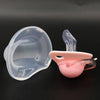 A silicone baby pacifier set with a protective cover and pink soothers displayed on a dark background.