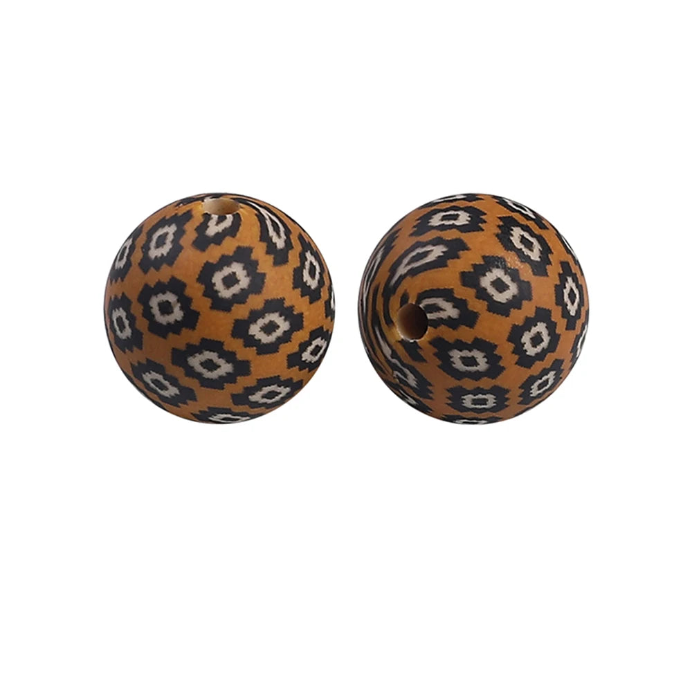 Pair of brown and black patterned silicone beads for jewelry making and DIY crafts
