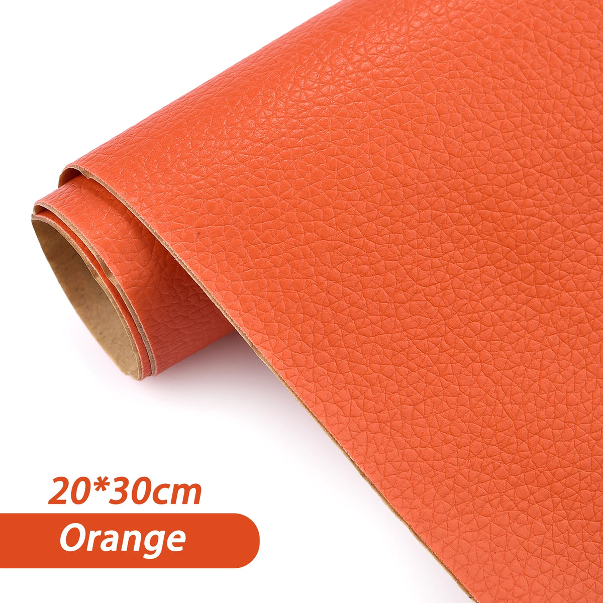 Roll of orange self-adhesive PU leather repair patches for fabric and bags