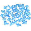 A pile of small, translucent blue acrylic cross beads for jewelry making.