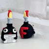 Handmade crochet F-bomb doll with a red and yellow top and an encouragement card