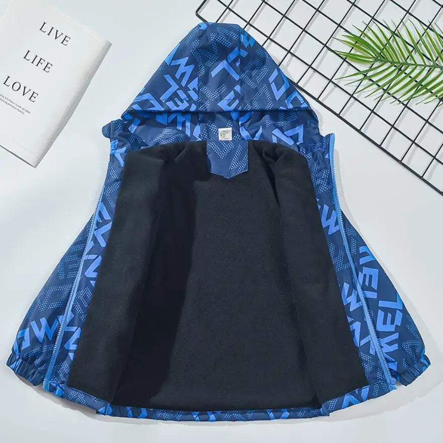 A blue and black kids waterproof winter jacket with a hood displayed on a white surface.