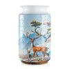 Blue and white porcelain 3D puzzle of a deer in a landscape with trees and mountains.