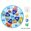 A circular dart board divided into numbered sectors with sticky balls for a game.