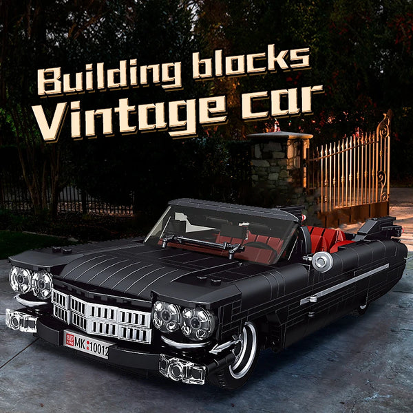 A detailed model kit of a black vintage car built from building blocks, displayed outdoors.