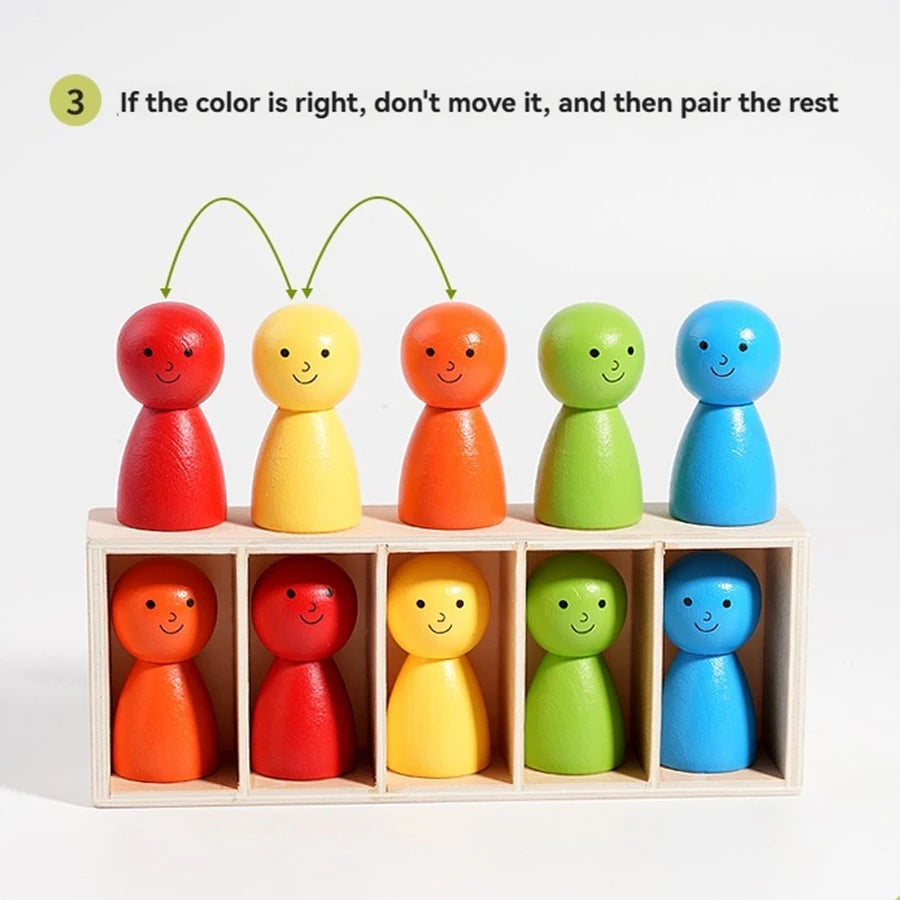 A set of colorful wooden figures in various shades of red, orange, yellow, green, and blue arranged for color matching.