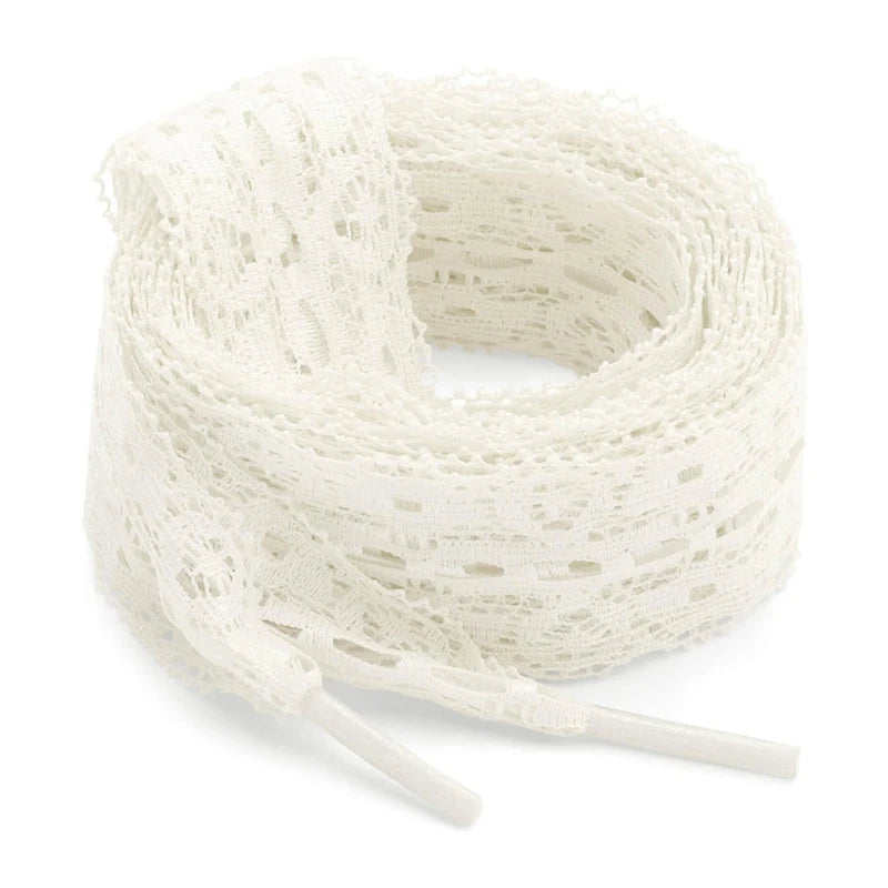 A spool of white flat elastic silk lace shoelaces coiled on a white background.
