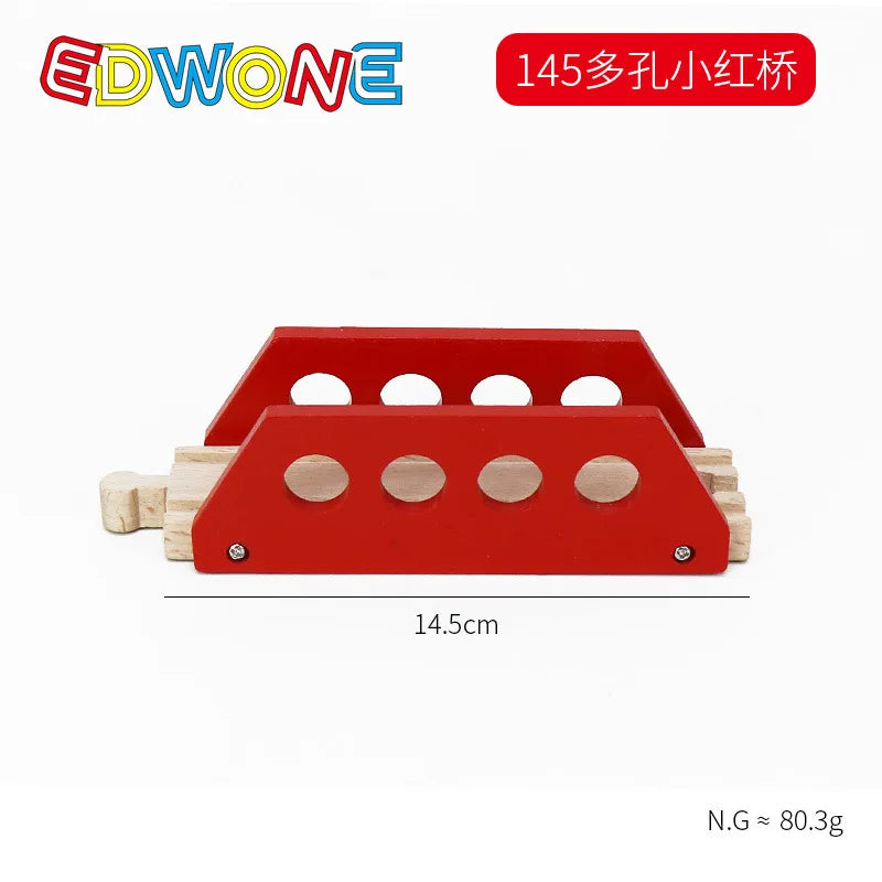 A red wooden train track accessory featuring a platform with multiple circular holes.