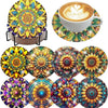 A set of floral diamond painting coasters featuring vibrant colors and detailed designs, displayed on a metal holder.