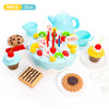 A blue DIY pretend play birthday cake tea set for kids featuring a teapot, cupcakes, and various food items.