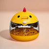 A yellow compact automatic egg incubator with a transparent window and a red top, resting on a light background.