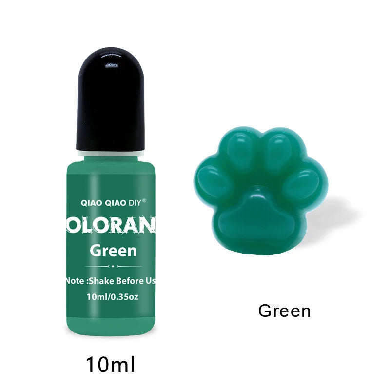 A green liquid pigment in a small glass bottle with a black cap labeled QIAO QIAO DIY Green